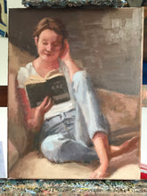 Load image into Gallery viewer, Portrait young woman reading a book on a couch original oil painting on canvas
