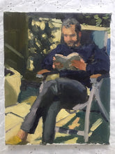 Load image into Gallery viewer, Oil painting Plein Air Portrait of a young man reading in a backyard original art painting on canvas figurative art
