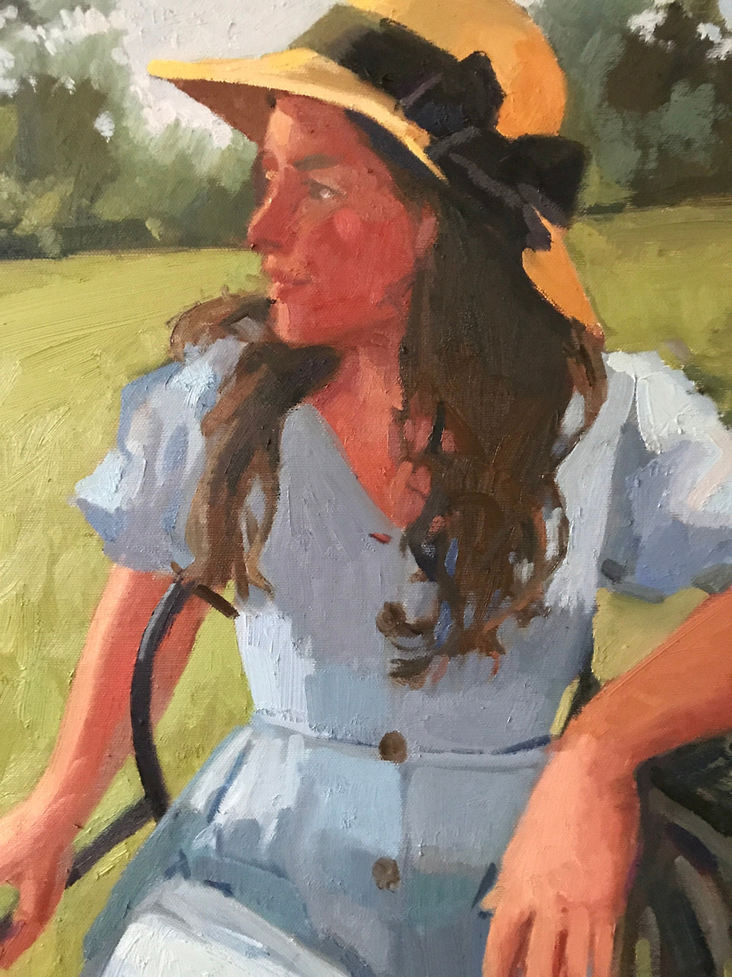 Profile female portrait painting on canvas oil paint portraiture woman in summer dress and a hat. Original portrait painting